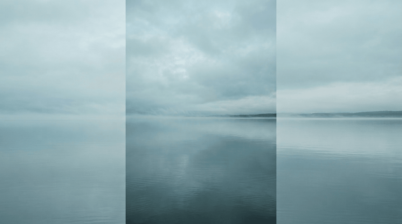 Still water and mist blending at the horizon—minimal reflective study.